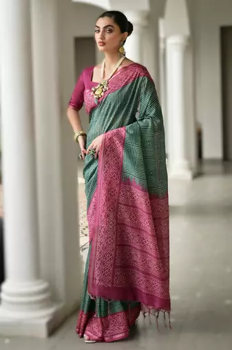 Green soft desi tussar silk saree with unique ikkat painted design & traditional pallu