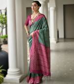 Green soft desi tussar silk saree with unique ikkat painted design & traditional pallu