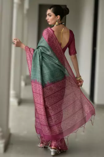Green soft desi tussar silk blend saree with unique ikkat painted design & pallu