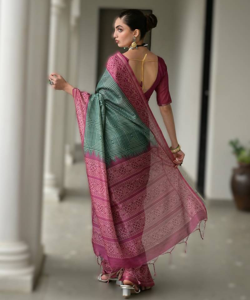 Green soft desi tussar silk saree with unique ikkat painted design & traditional pallu