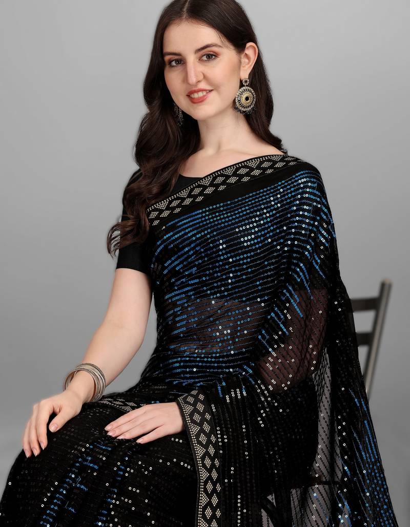 Teal heavy georgette designer saree with double run sequins embroidery & satin lace border