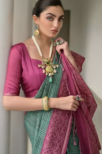 Green soft desi tussar silk blend saree with unique ikkat painted design & pallu