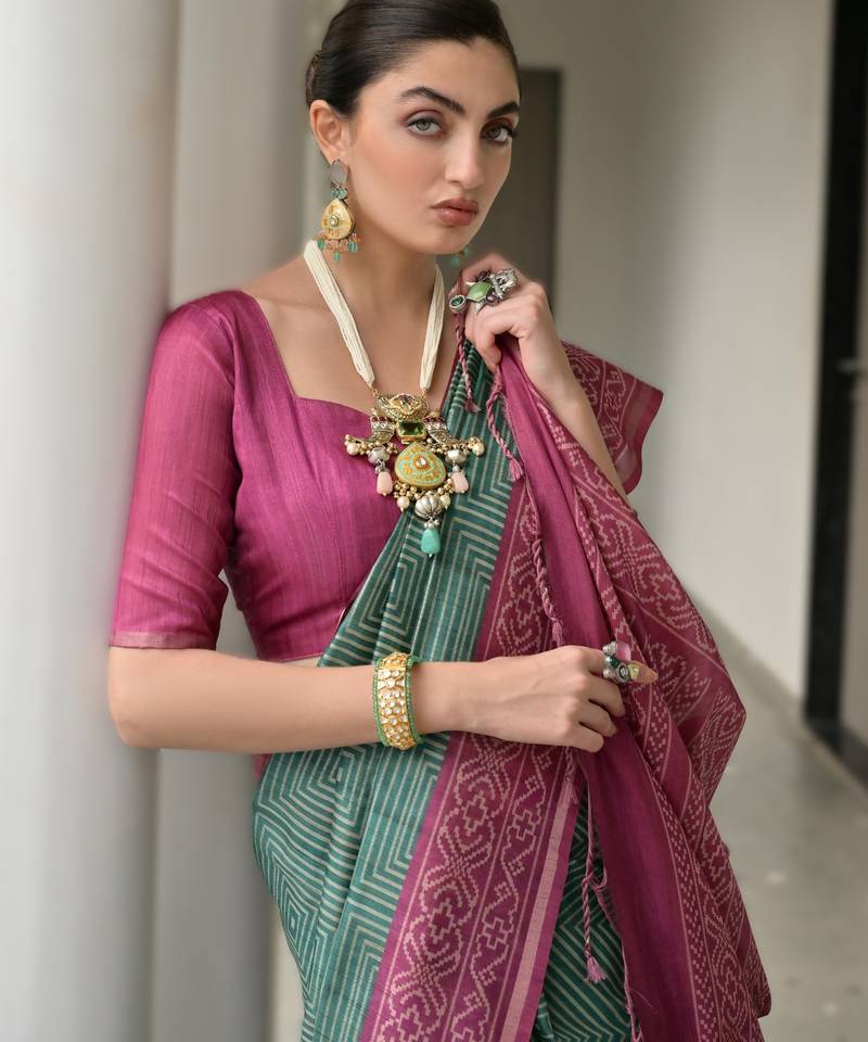Green soft desi tussar silk saree with unique ikkat painted design & traditional pallu