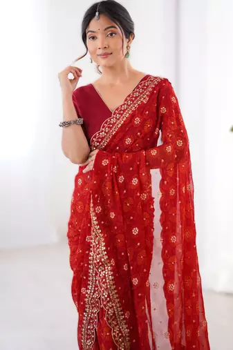 Red floral printed georgette chiffon saree with foil work & embroidered lace border