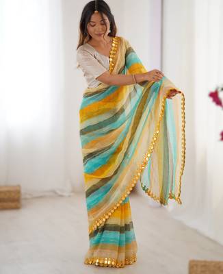 Yellow heavy smooth marble chiffon leriya print saree with zari work & double line paper mirror border 1