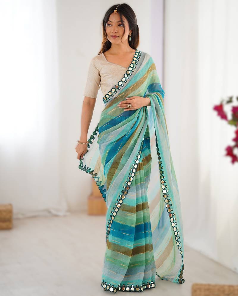 Sea green heavy smooth marble chiffon leriya print saree with zari work & double line paper mirror border