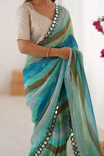 Sea green smooth marble chiffon leriya print saree with zari work & double line paper mirror border