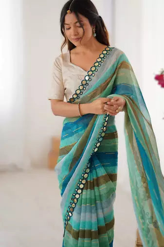 Sea green smooth marble chiffon leriya print saree with zari work & double line paper mirror border
