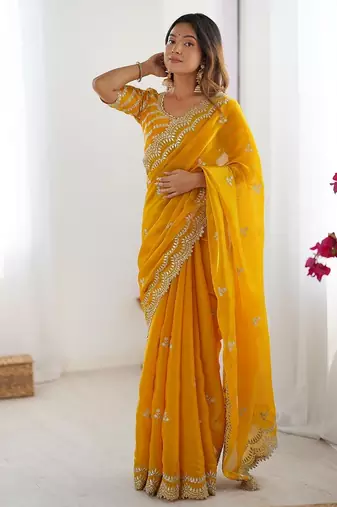 yellow color art silk blend thread sequince embroidered saree with blouse