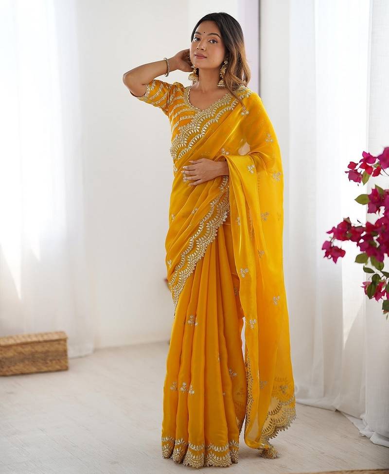 yellow color art silk blend thread sequince embroidered saree with blouse