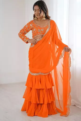 orange color faux georgette thread sequince work ruffle saree with blouse