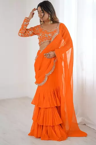 orange color faux georgette thread sequince work ruffle saree with blouse