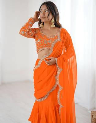 orange faux georgette thread sequince work ruffle saree with blouse 5