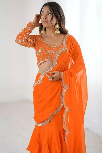 orange color faux georgette thread sequince work ruffle saree with blouse