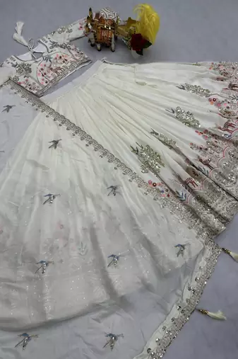 white vichitra silk lehenga with embroidery