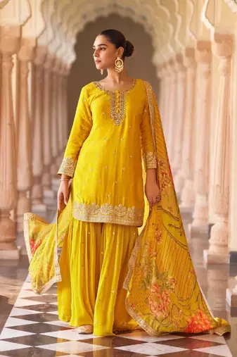 Yellow embroidered silk sharara salwar kameez