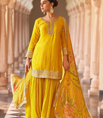 Yellow embroidered silk sharara salwar kameez