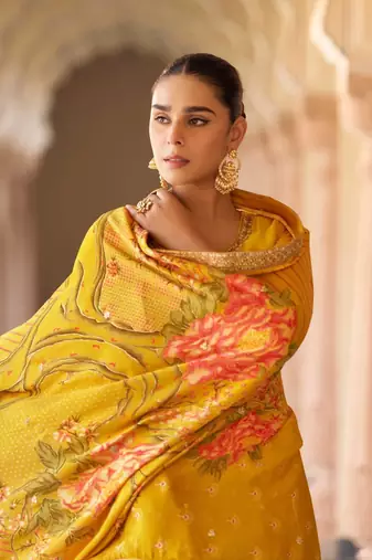 Yellow embroidered silk sharara salwar kameez