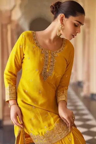 Yellow embroidered silk sharara salwar kameez