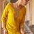 Yellow embroidered silk sharara salwar kameez