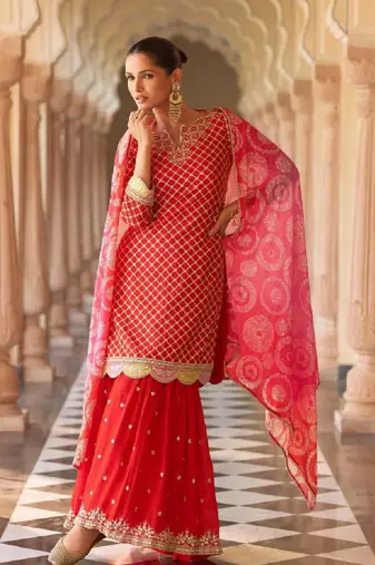 Red embroidered silk sharara salwar kameez