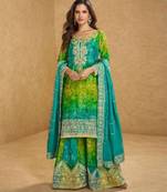 Green embroidered silk sharara salwar kameez