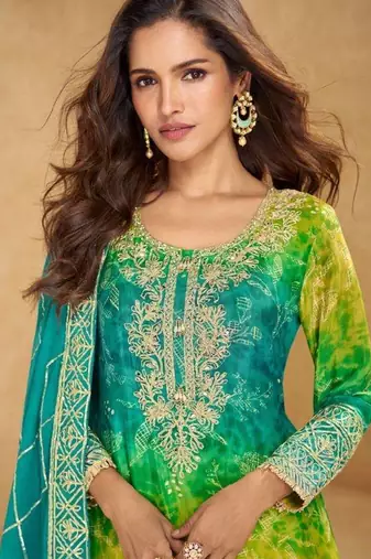 Green embroidered silk sharara salwar kameez