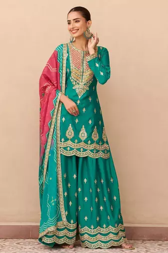Turquoise embroidered silk sharara salwar kameez