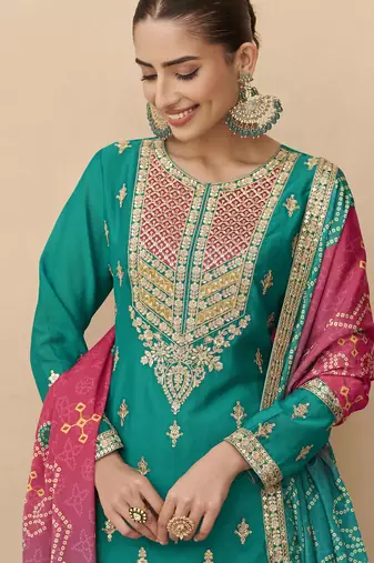 Turquoise embroidered silk sharara salwar kameez