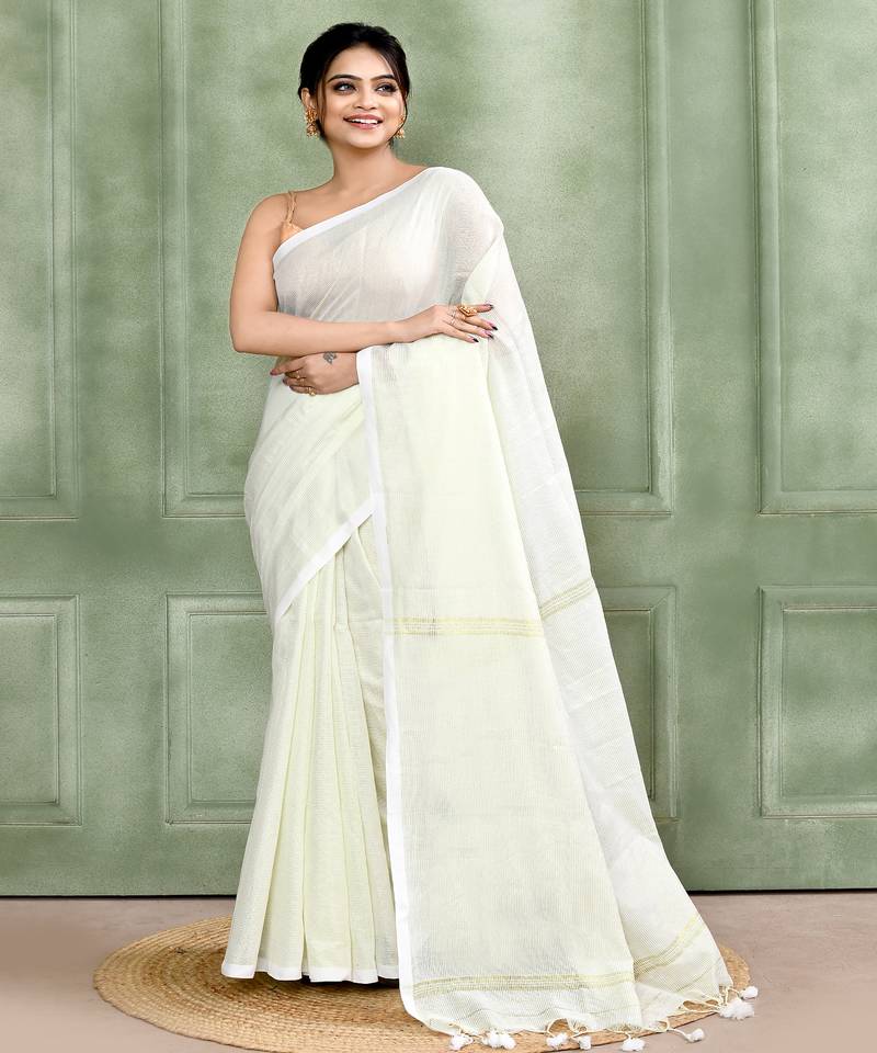 white embellished cotton blend zari check handloom saree
