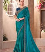 teal blue satin georgette saree with embroidery and sequins