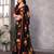 black printed georgette saree with lace border & blouse piece
