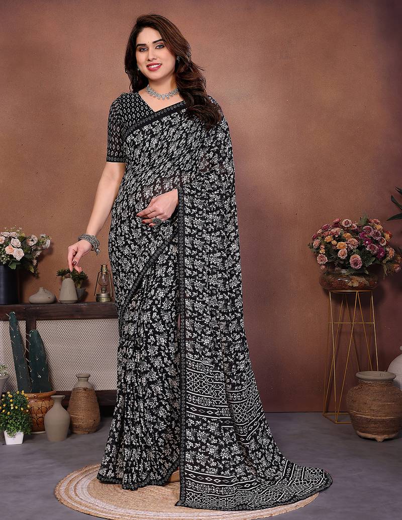 black floral georgette saree with lace border & blouse piece
