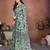 green geometric print georgette saree with lace border & blouse piece