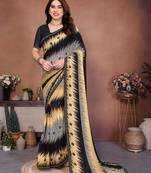 black geometric print georgette saree with lace border & blouse piece