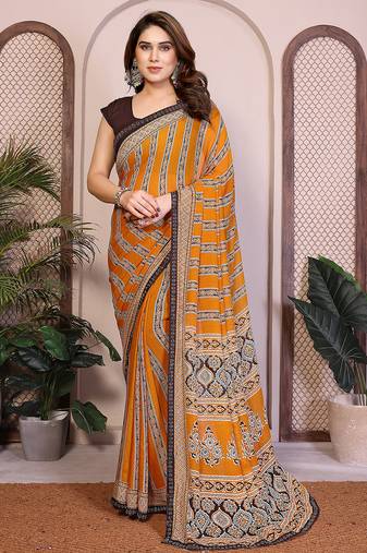   yellow floral georgette saree with lace border & blouse piece