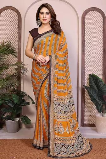   yellow floral georgette saree with lace border & blouse piece