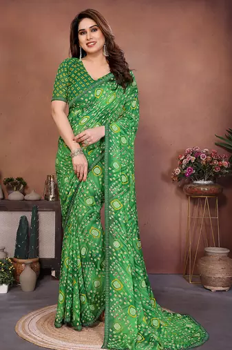 green printed georgette saree with lace border & blouse piece