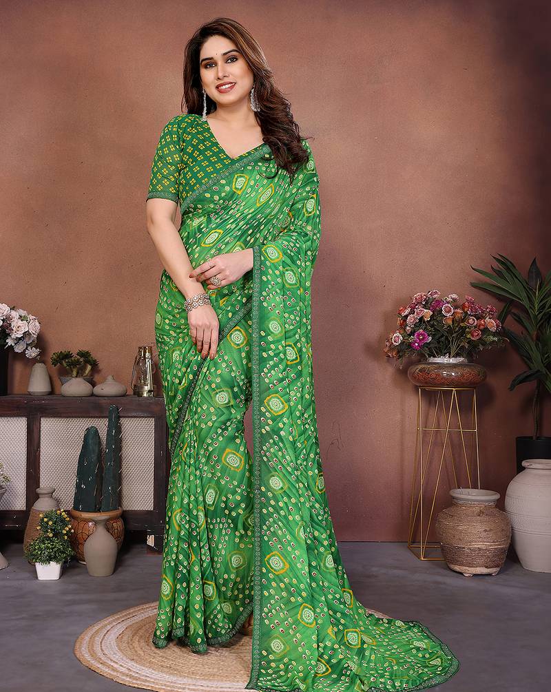 green printed georgette saree with lace border & blouse piece