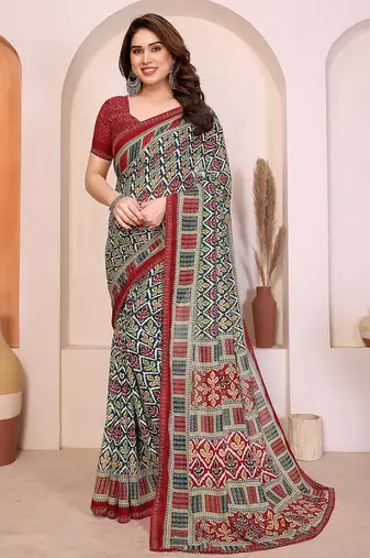 green geometric print georgette saree with lace border & blouse piece