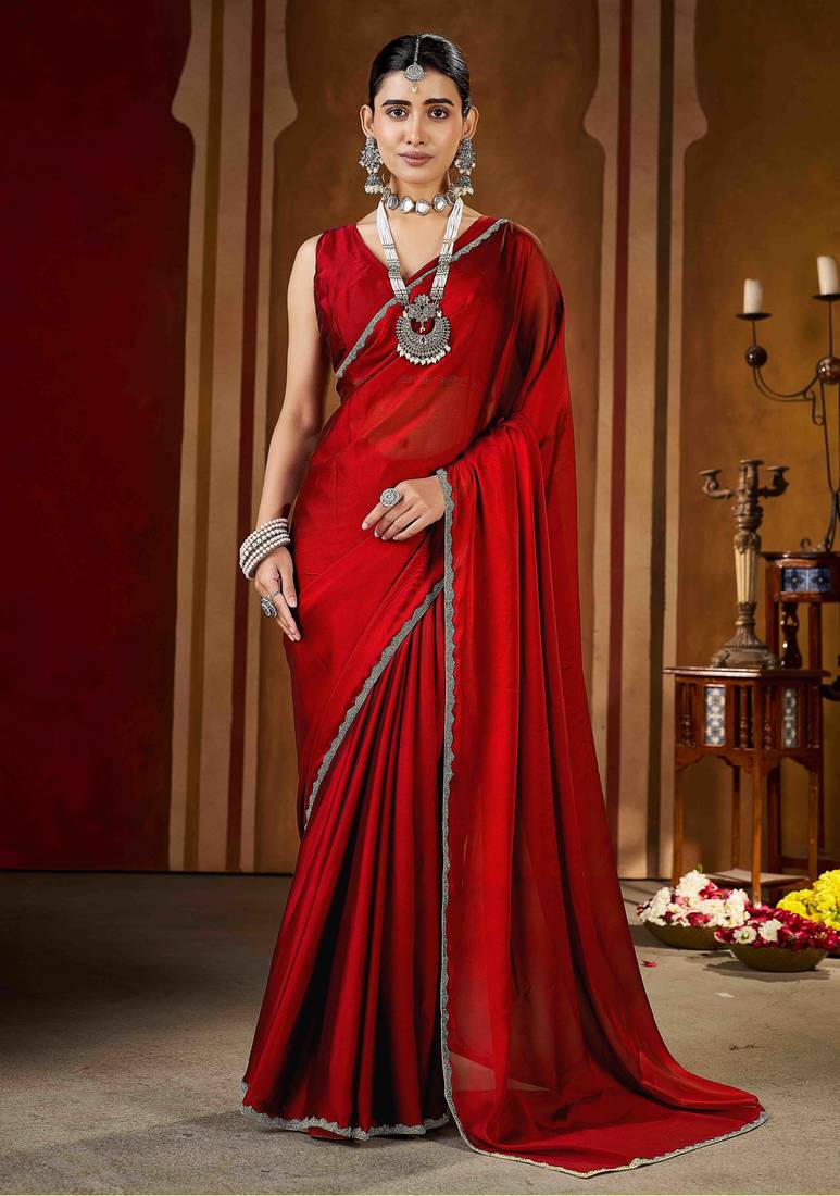 Party wear new rangoli silk red color saree with blouse and stone lace border