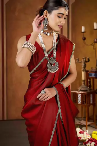 Party wear new rangoli silk red color saree with blouse and stone lace border
