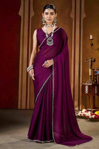 Party wear new rangoli silk wine color saree with blouse and stone lace border