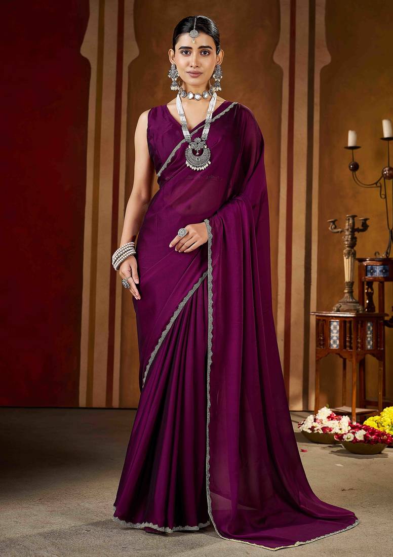 Party wear new rangoli silk wine color saree with blouse and stone lace border