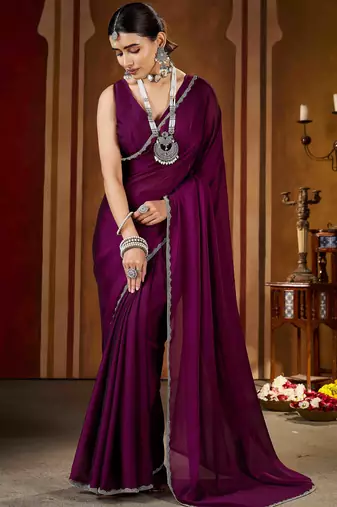 Party wear new rangoli silk wine color saree with blouse and stone lace border