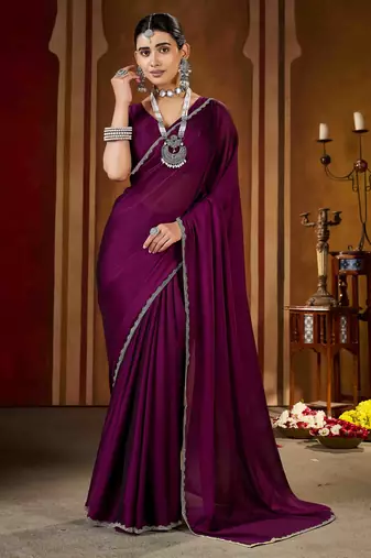 Party wear new rangoli silk wine color saree with blouse and stone lace border