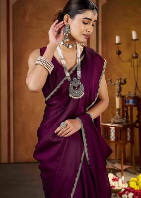 Party wear new rangoli silk wine color saree with blouse and stone lace border 4