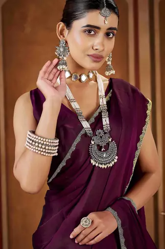 Party wear new rangoli silk wine color saree with blouse and stone lace border