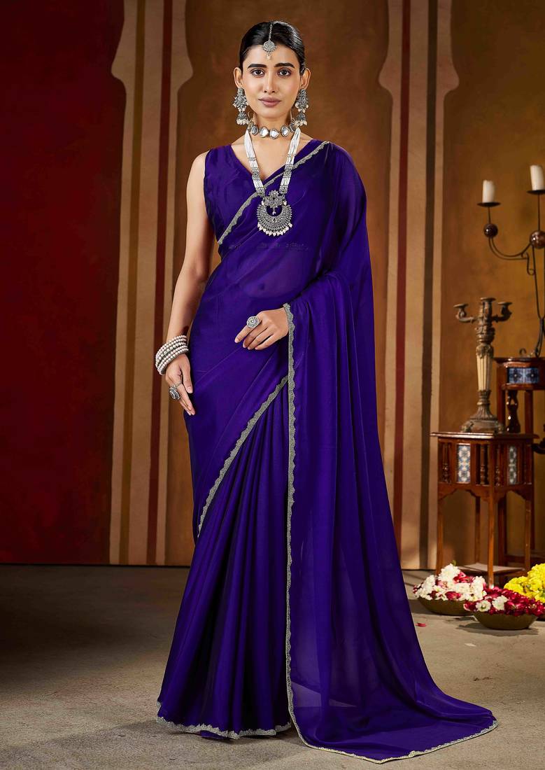 Party wear new rangoli silk violet color saree with blouse and stone lace border