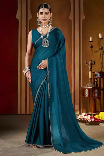 Festive rama green rangoli silk saree with beads lace design